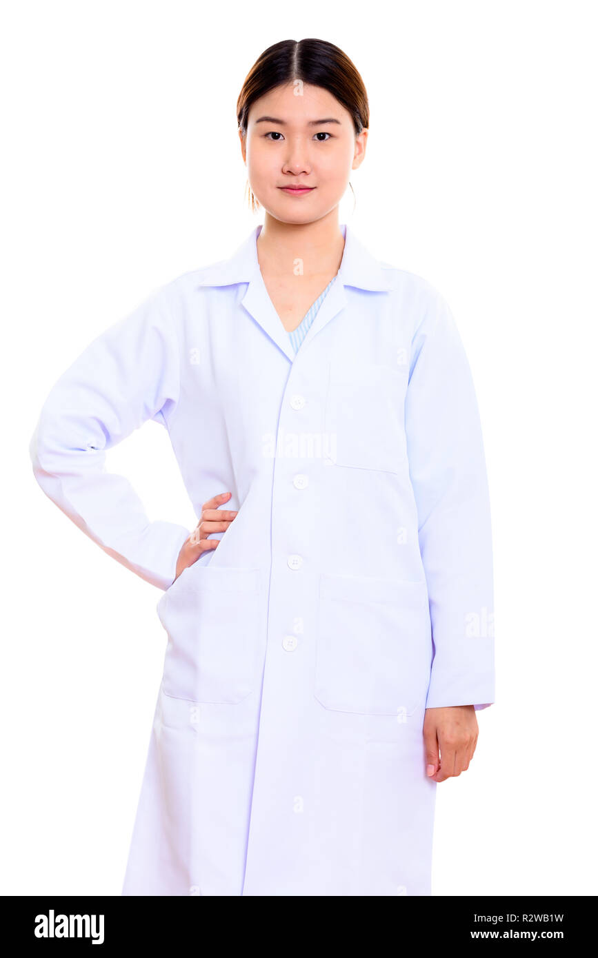 Studio shot of young beautiful Asian woman doctor standing with Stock ...