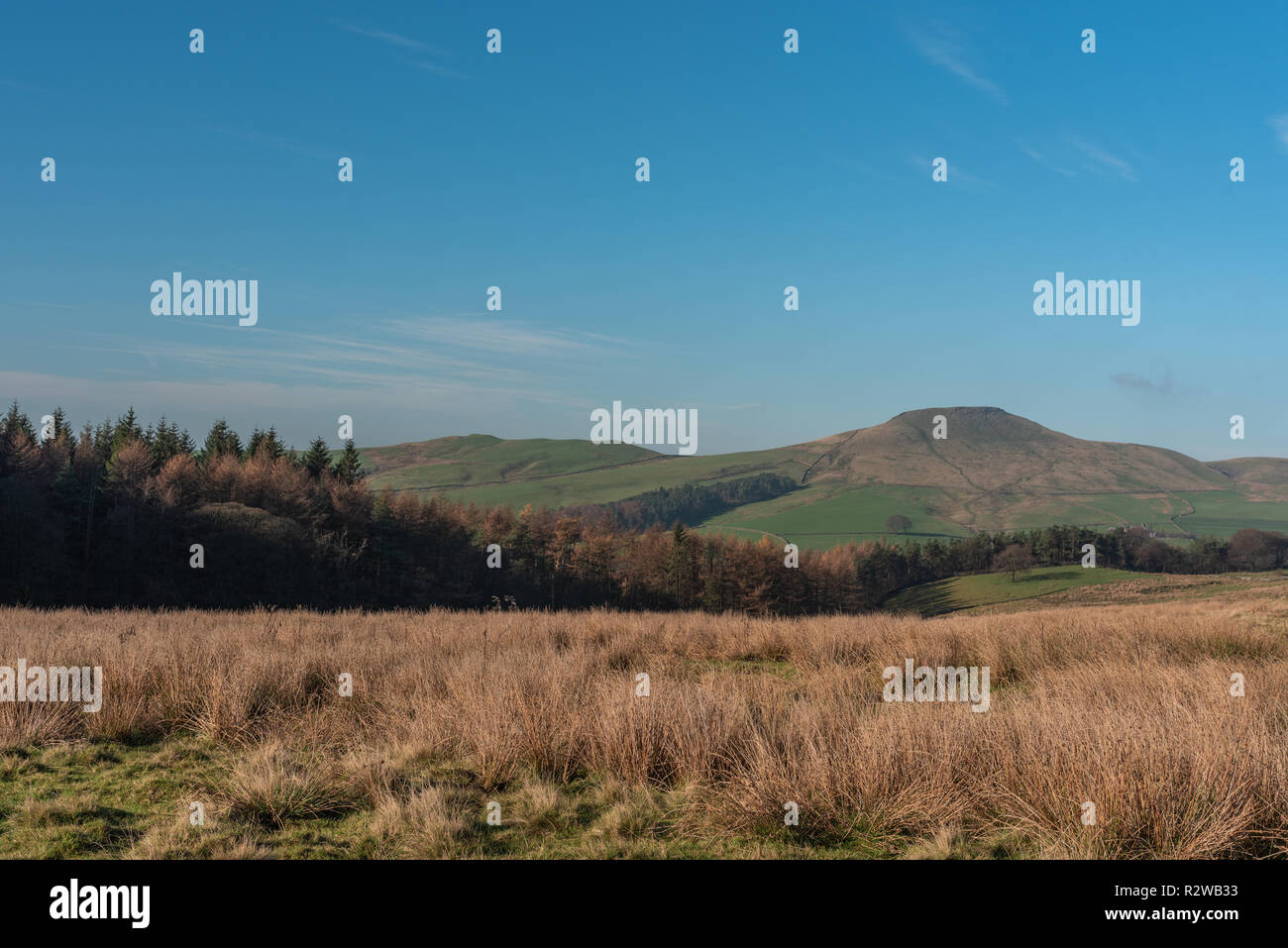 View to a distant Shutlingsloe hill in Cheshire, Peak District National Park. Stock Photo