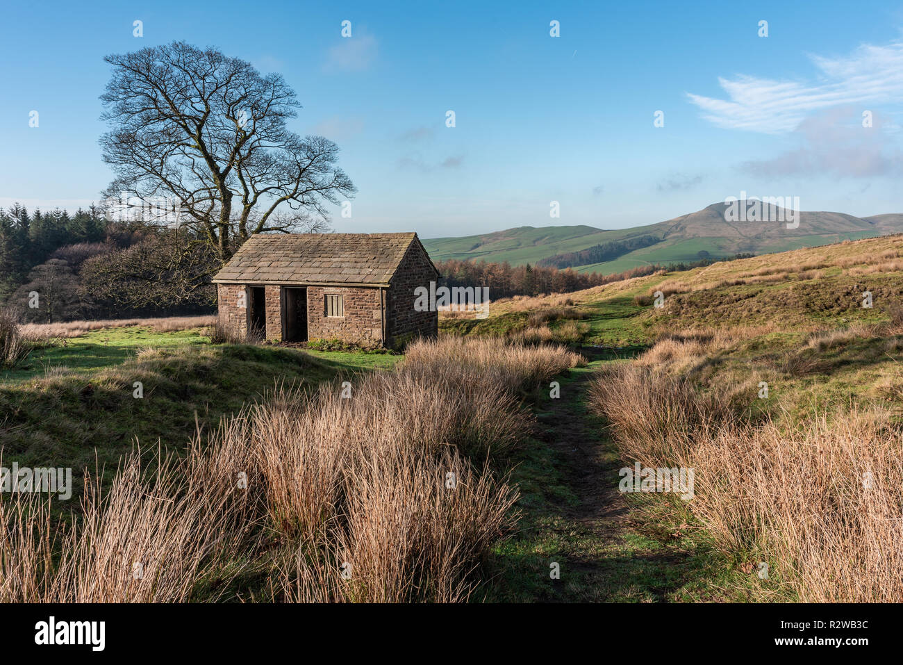 View to a distant Shutlingsloe hill in Cheshire, Peak District National Park. Stock Photo