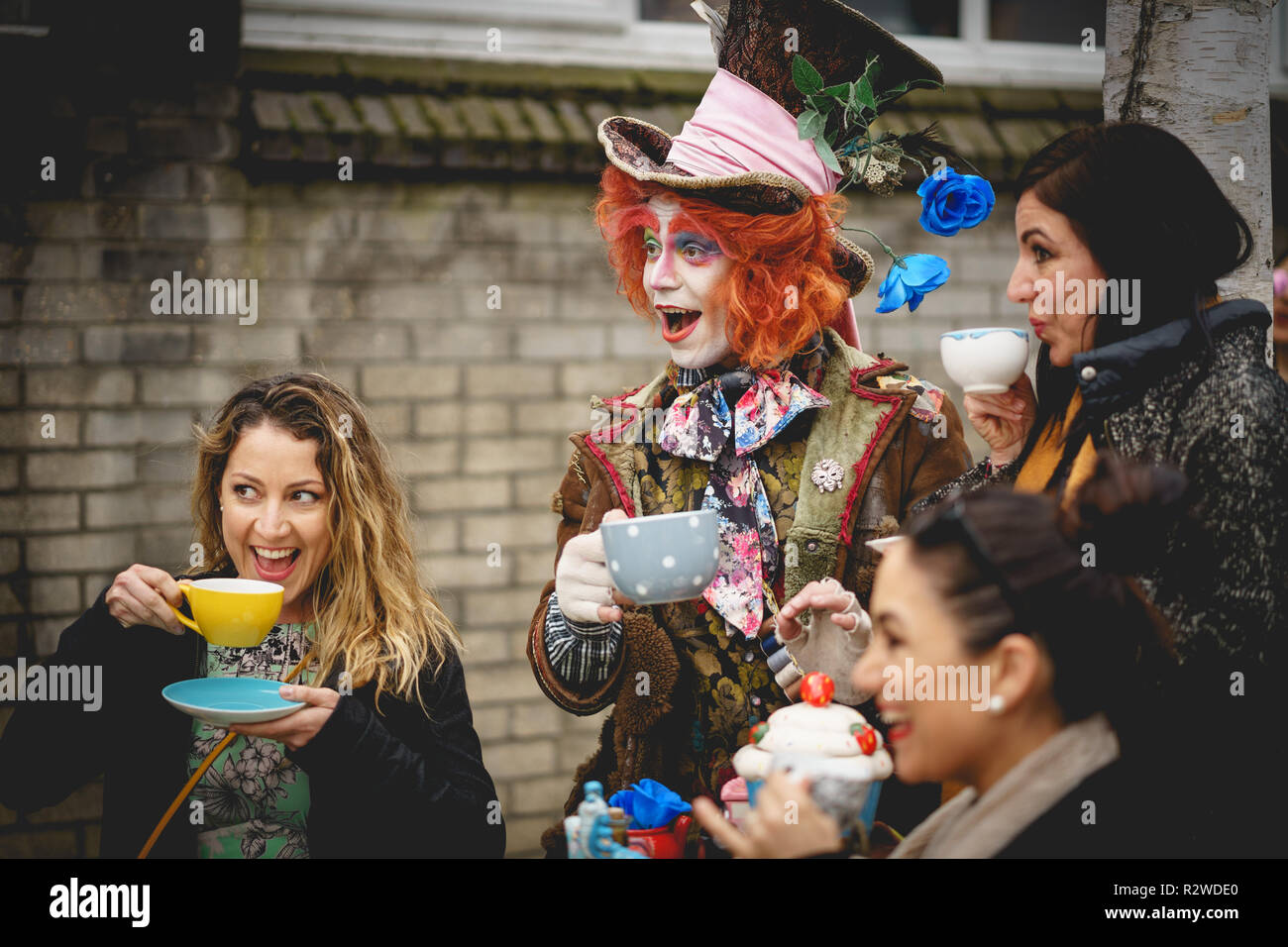 London, UK - February, 2019. A street artist impersonating the Hatter from Alice's Adventures in Wonderland in Portobello Road, Notting Hill. Stock Photo