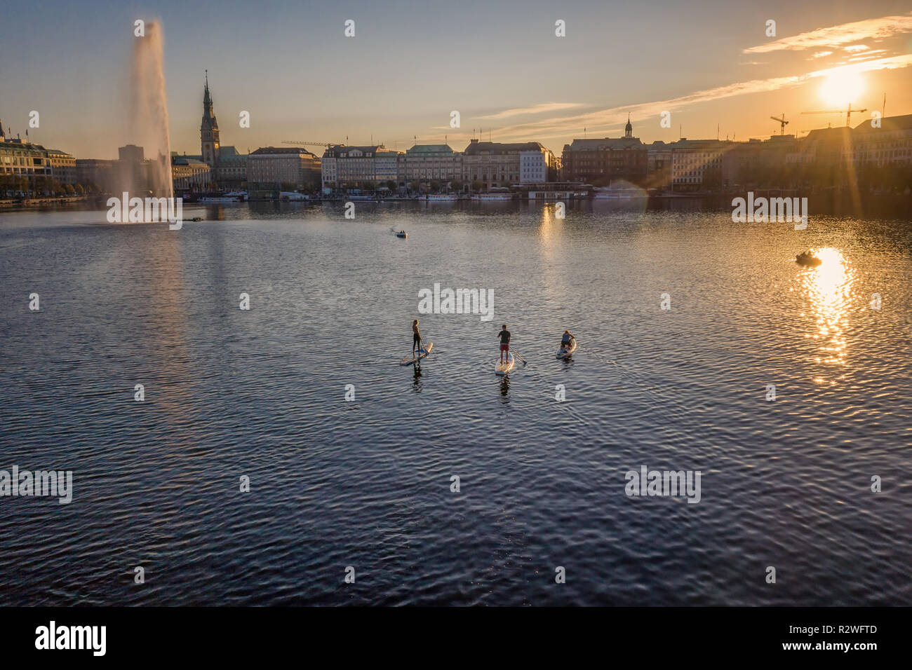 stand-up paddling on inner alster lake Stock Photo