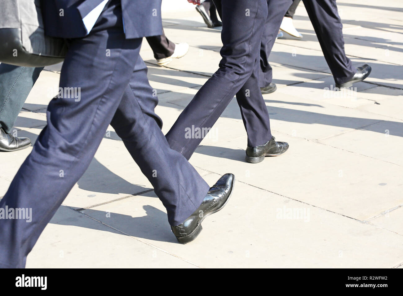 businessmen walking in a hurry Stock Photo