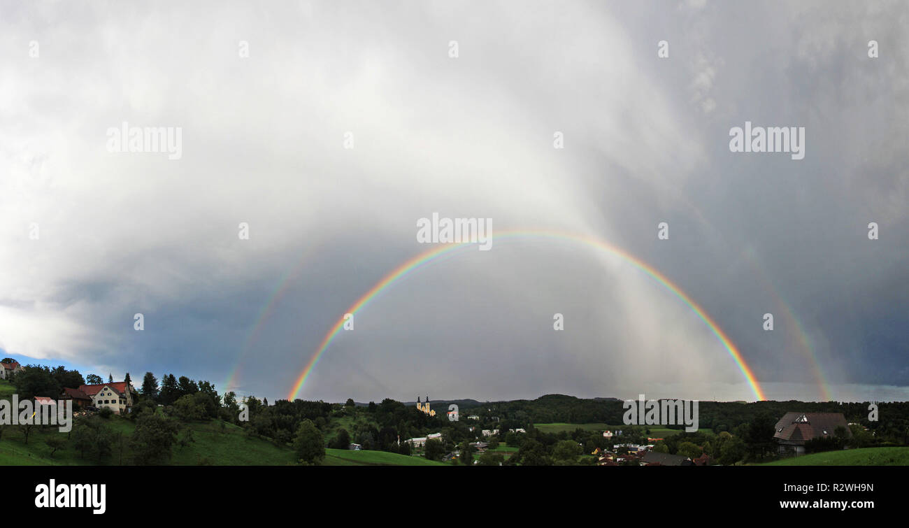 rainbow with basilica Stock Photo