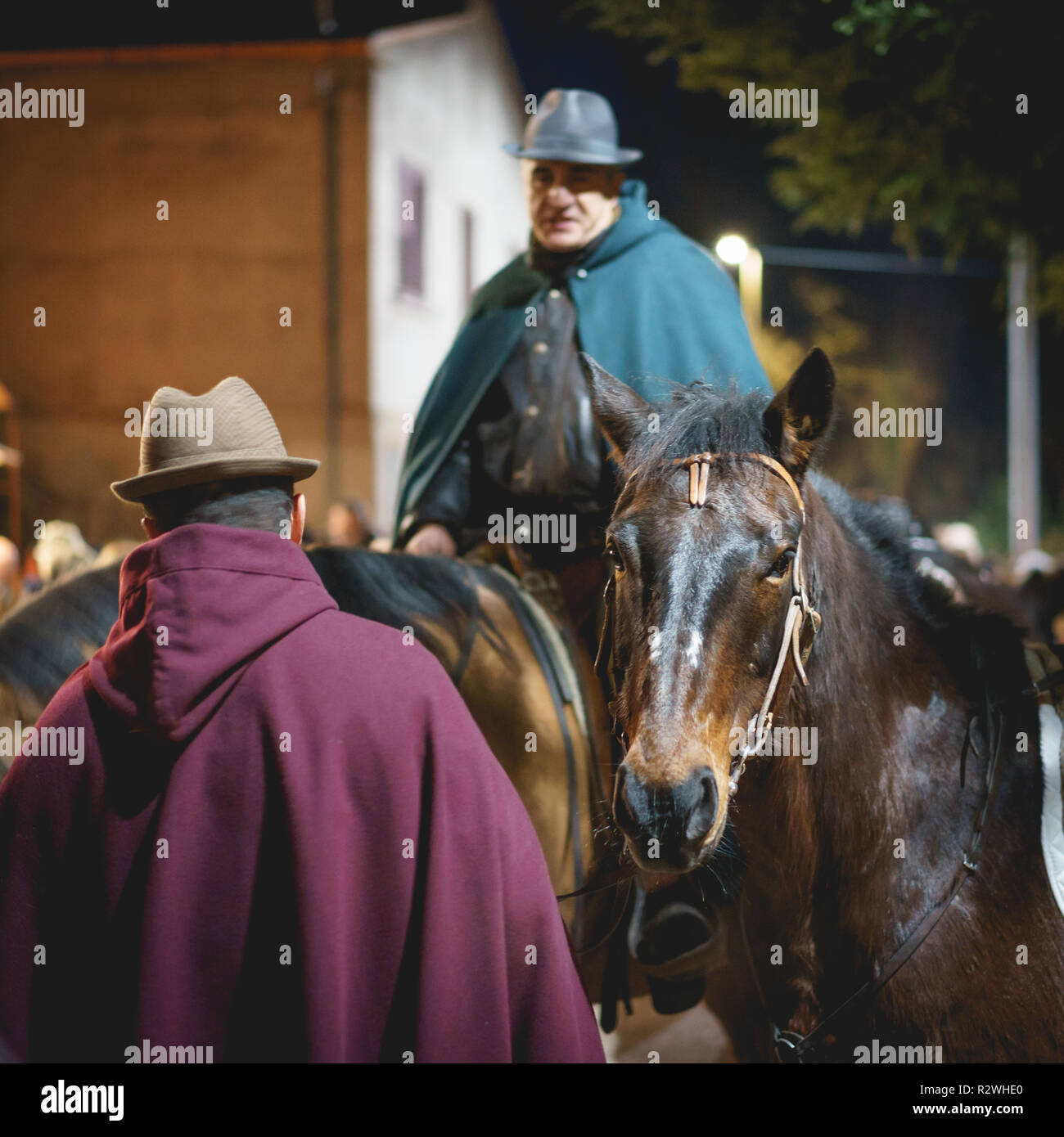Rasiglia (Foligno), Italy - January 2018. Wayfarers riding horses in a living Christmas Nativity scene reenactment. Stock Photo
