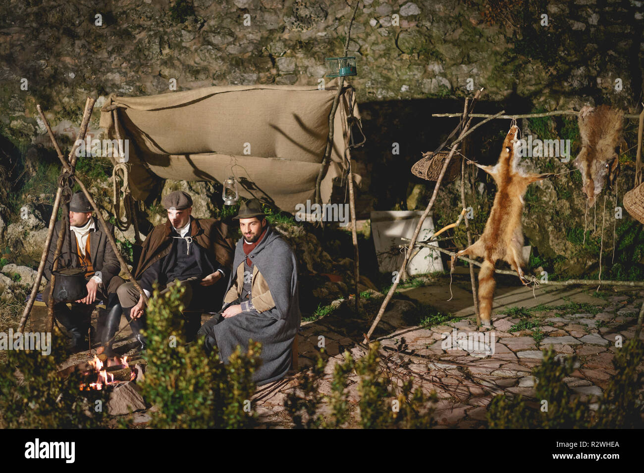 Rasiglia (Foligno), Italy - January 2018. Hunters camping during a living Christmas Nativity scene reenactment. Stock Photo