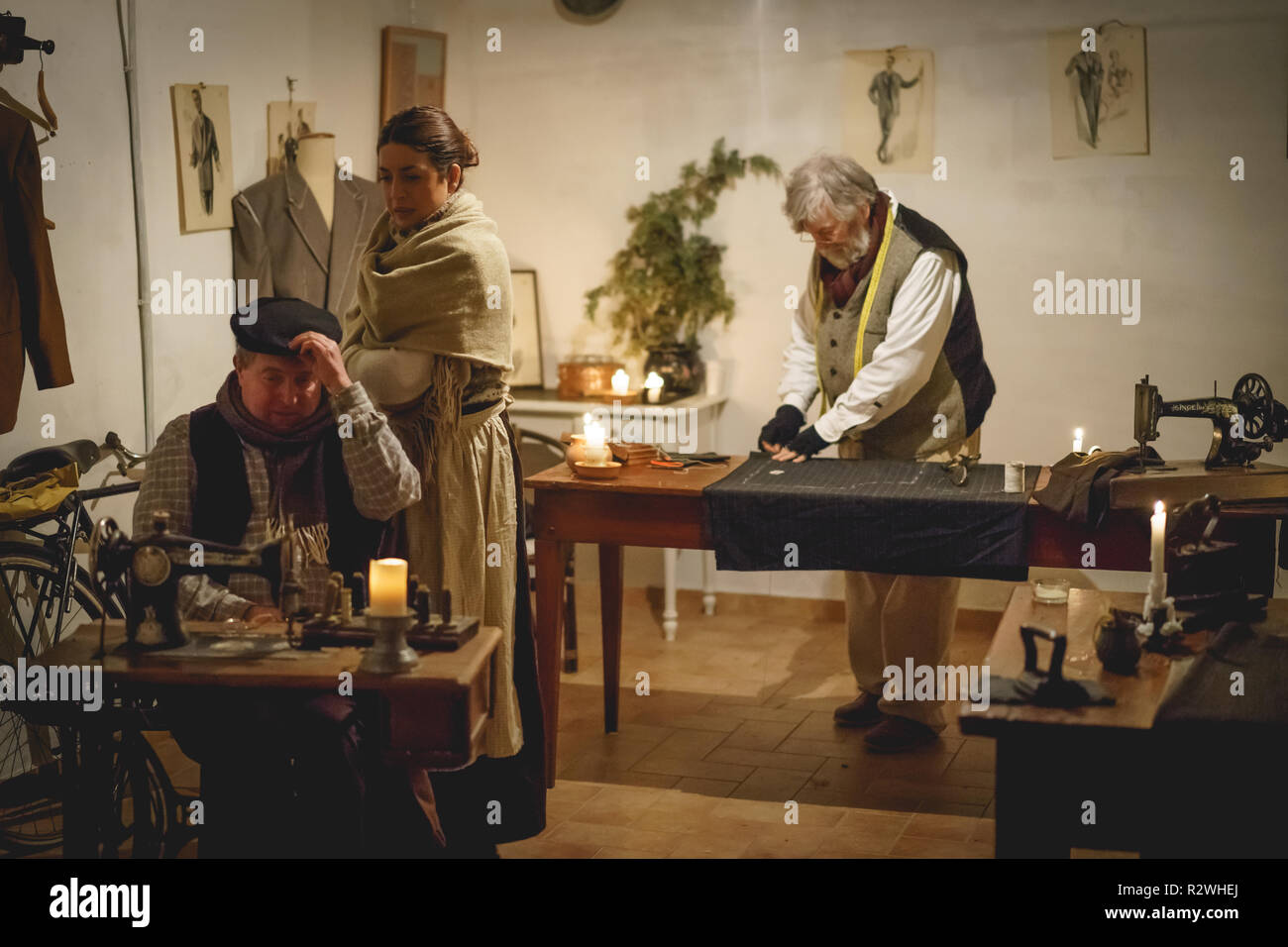 Foligno, Italy - January 2018. Old tailoring shop in a living Christmas Nativity scene reenactment. Stock Photo