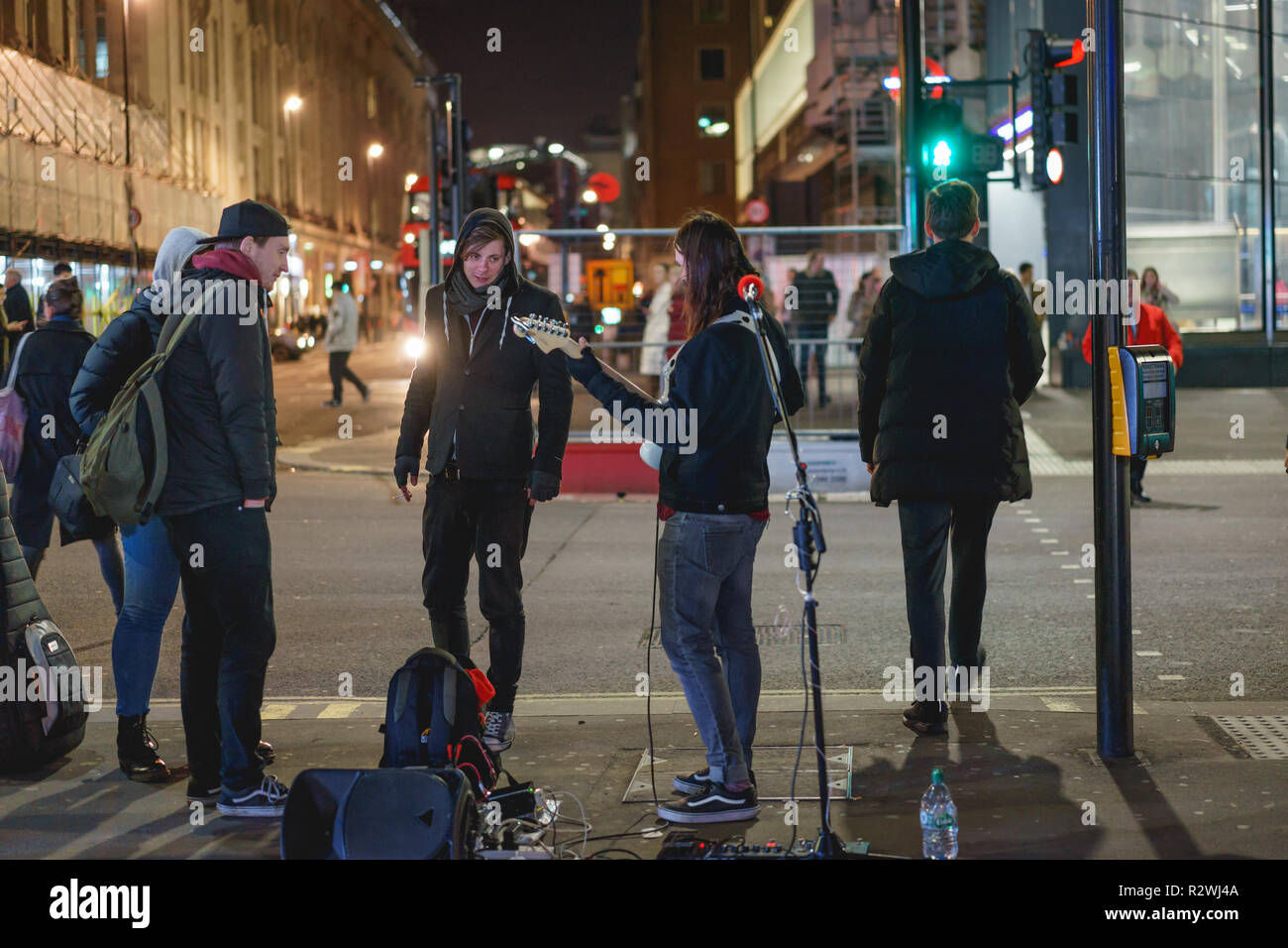London, UK - February, 2019. A street group of musicians performing on the street near Oxford street. Stock Photo