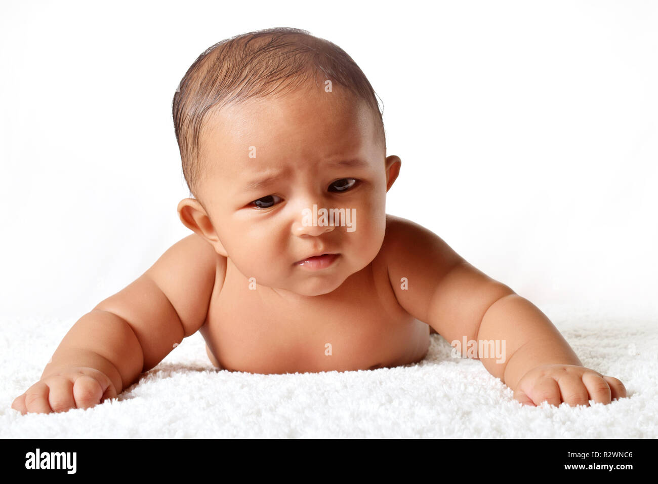 Cute baby sleeping on bed on stomach, Pune, Maharashtra Stock Photo Alamy