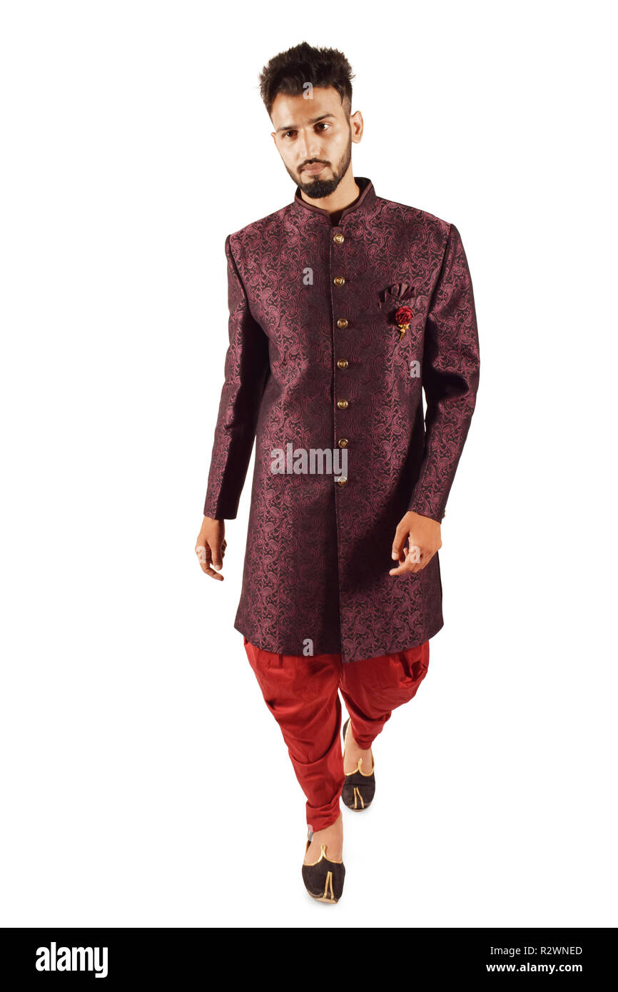 Image of A Young Indian Man In traditional Ethnic Wear or Sherwani and  Posing With a Smile Face On an Isolated White Background-JH998537-Picxy