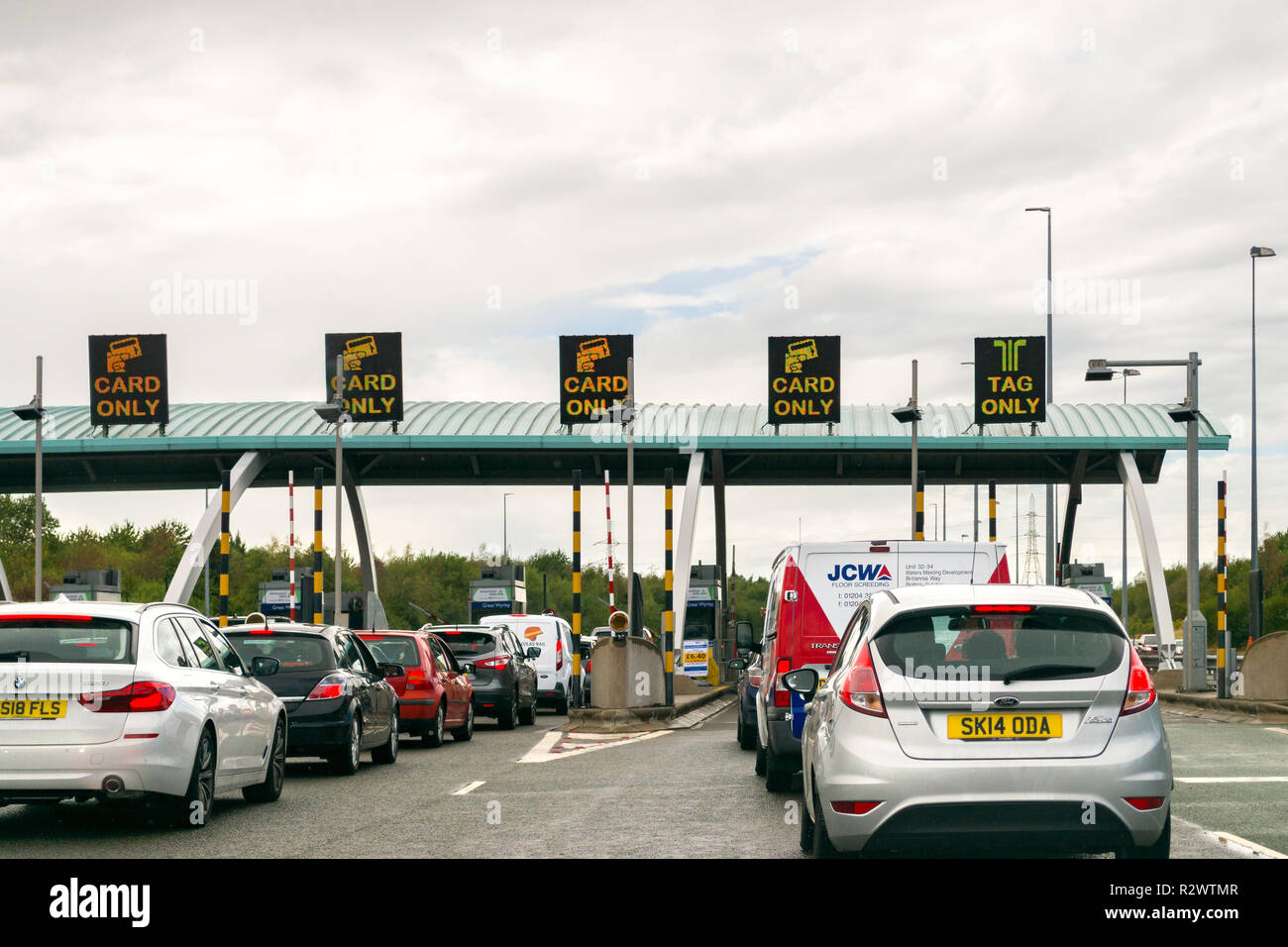 Vehicles queueing at the Great Wyrley toll booths on the M6 heading North, United Kingdom Stock Photo