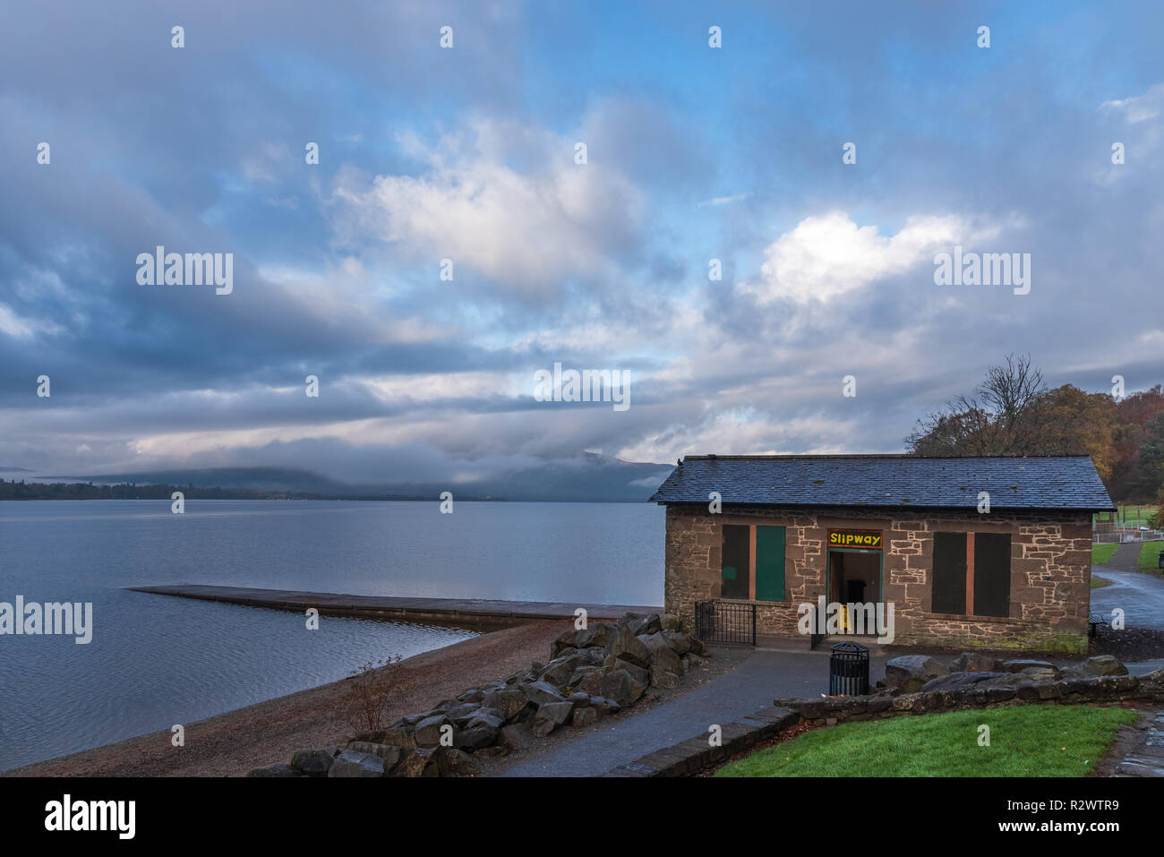 The Slipway Cafe at Balloch Park on the shores of Loch Lomond with the Luss hills in the background.. Stock Photo