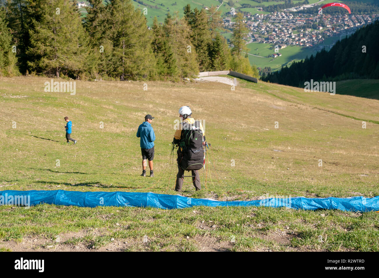 Paragliding from the summit of Elfer mountain down to Neustift im Stubaital, Tyrol, Austria Stock Photo