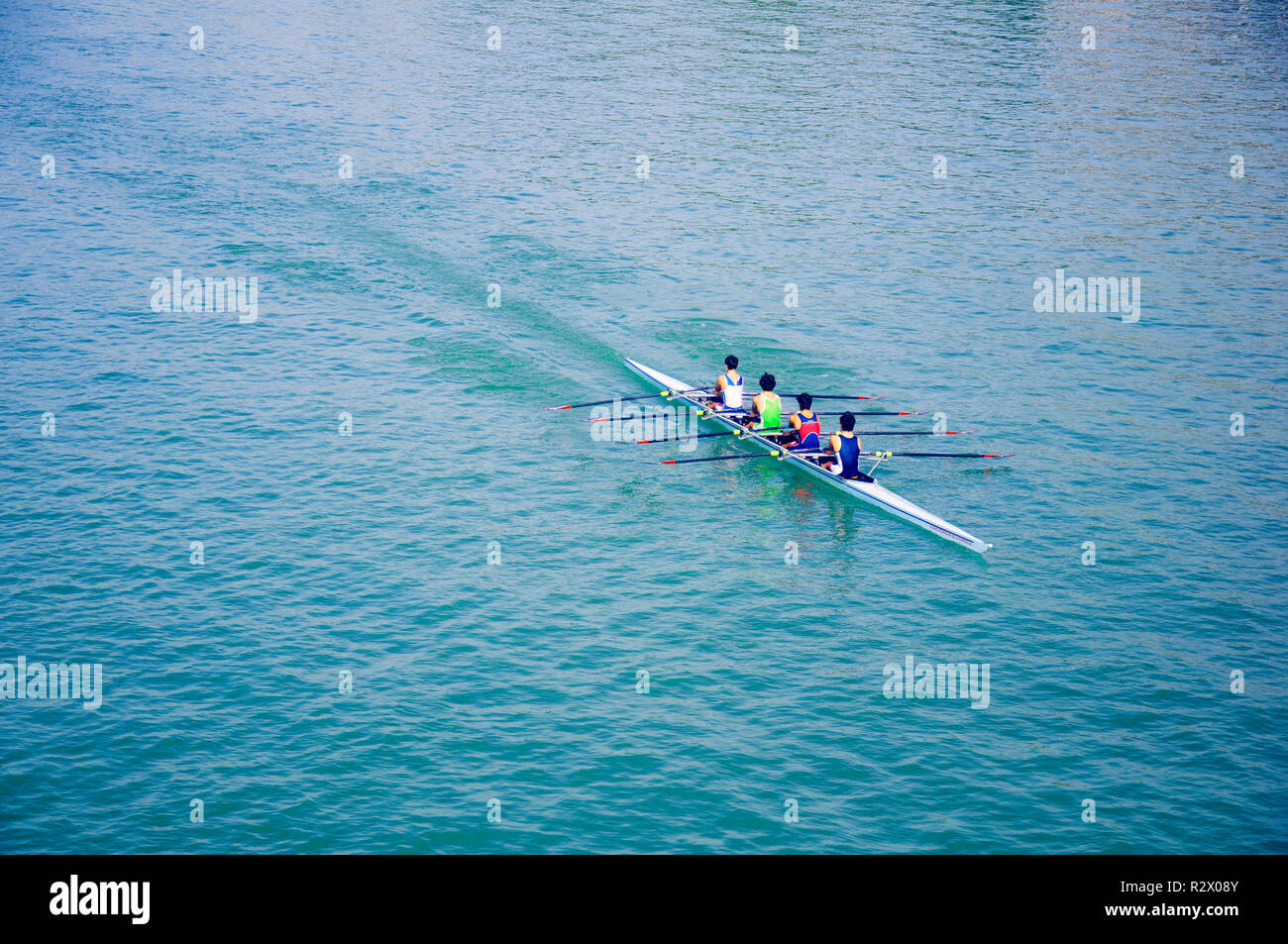 Four sportsmen on the canoe, blue river, autumn Stock Photo Alamy