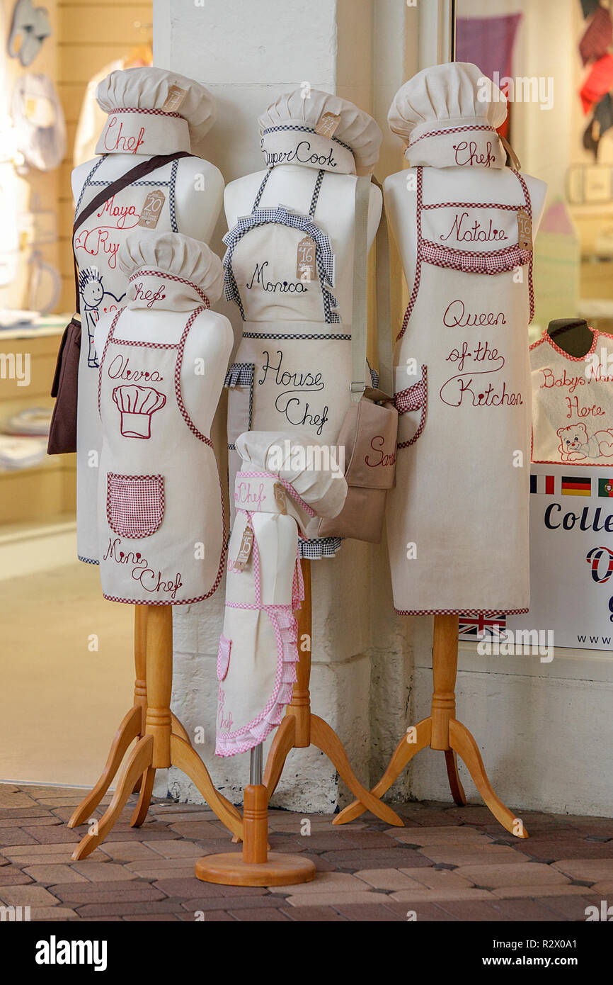 One of a set of (20) images related to the city of Oxford, viewed here are women aprons for sale inside Oxford Indoor Market. Stock Photo