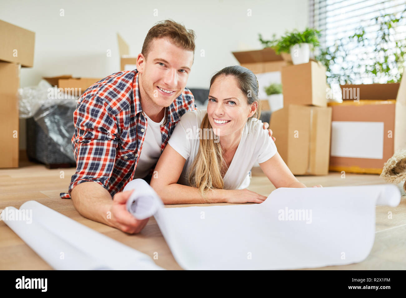 Happy young couple together plans home building or house purchase Stock Photo