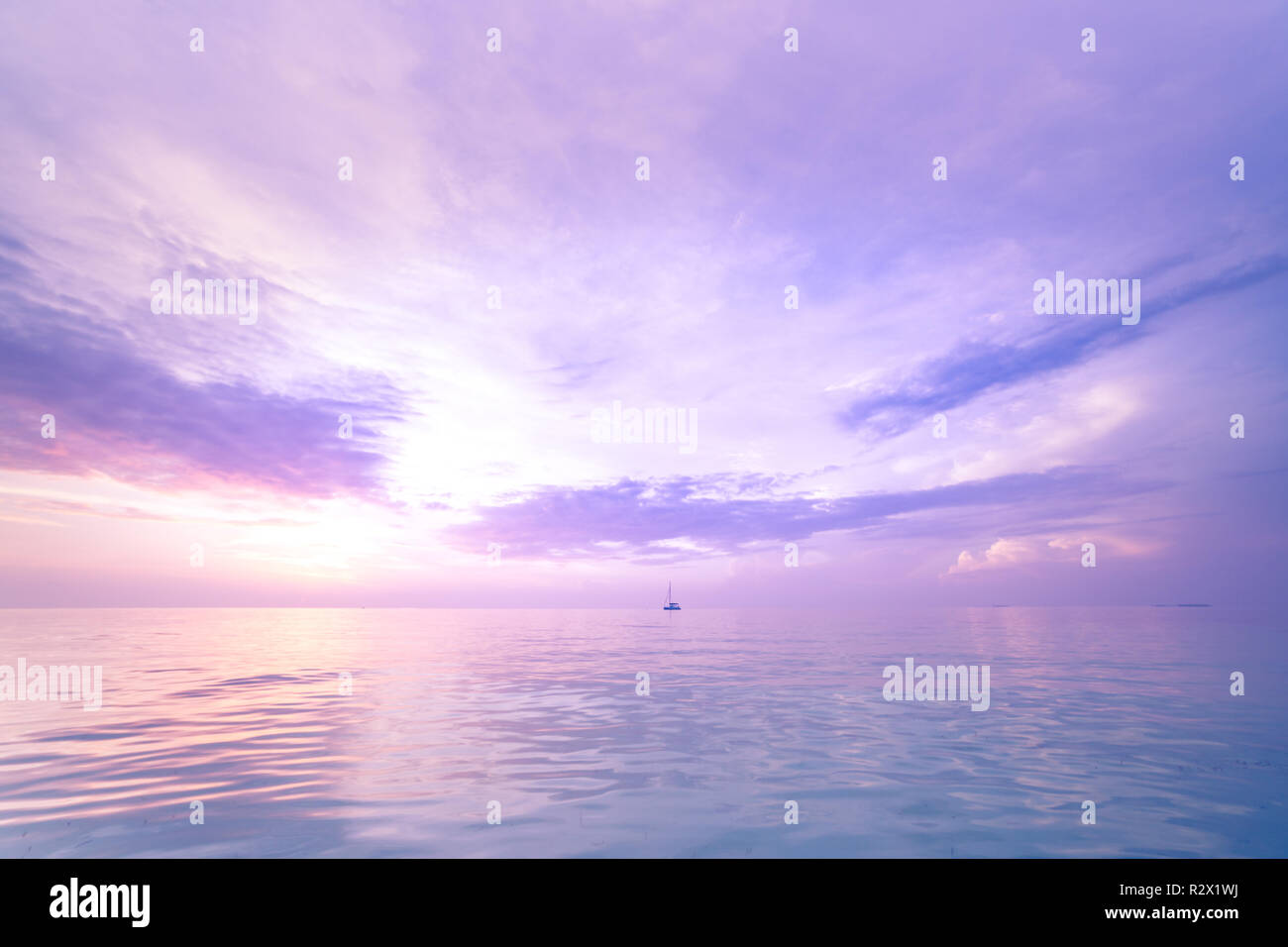 Sea sky clouds, horizon. Colorful seascape horizontal background banner. Inspirational calm sea with sunset sky. Meditation ocean and sky background Stock Photo