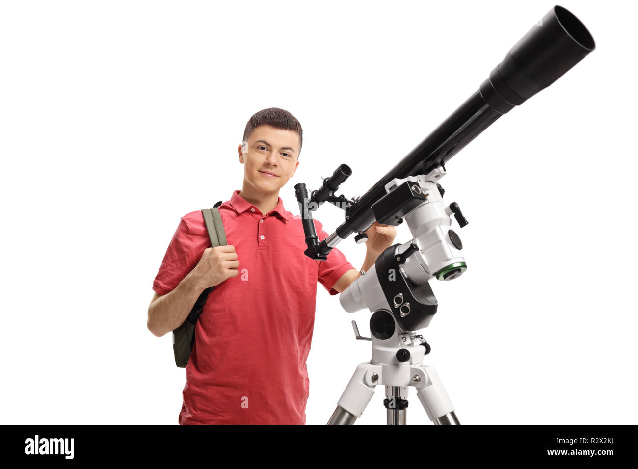 Male student with a telescope isolated on white background Stock Photo