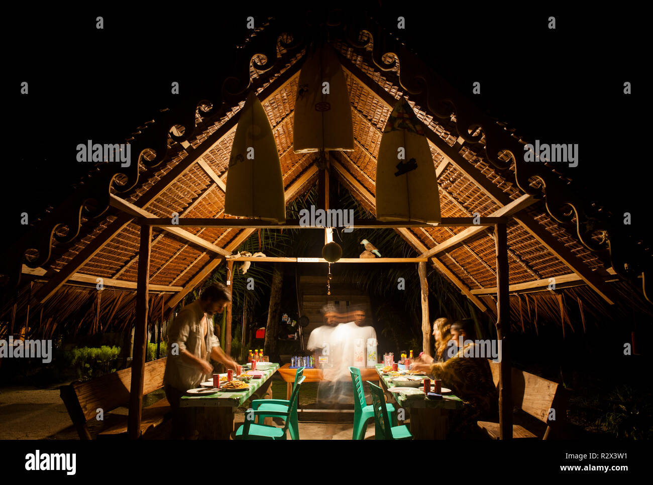 Beach bungalows / open air kitchen at Bintang Surf Camp, South Siberut. Stock Photo