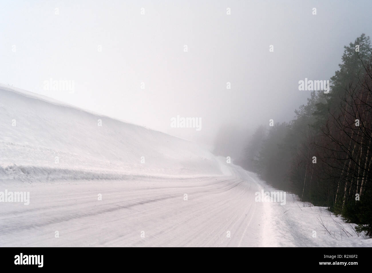Winter landscape with country road Stock Photo