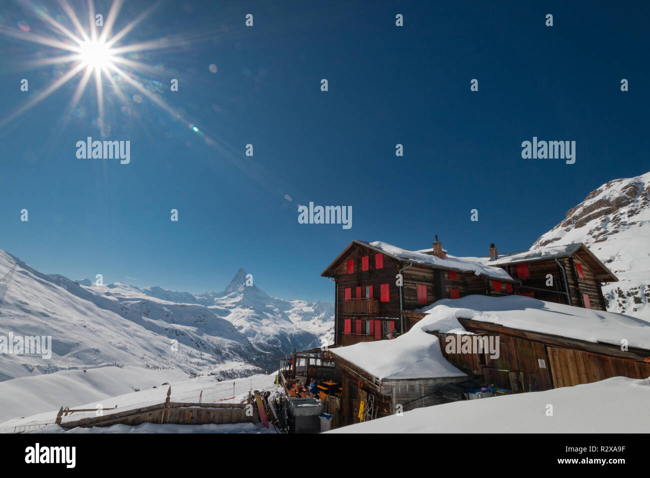 Zermatt, Switzerland - March 21, 2018: Hotel and mountain restaurant Fluhalp at elevation of 2606 meters in the skiing and hiking area of of Zermatt,  Stock Photo