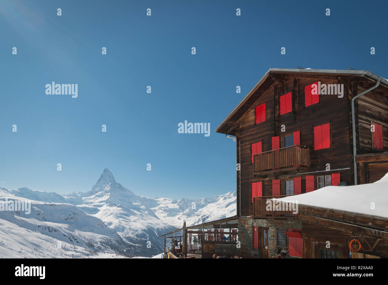 Zermatt, Switzerland - March 21, 2018: Hotel and mountain restaurant Fluhalp at elevation of 2606 meters in the skiing and hiking area of of Zermatt,  Stock Photo