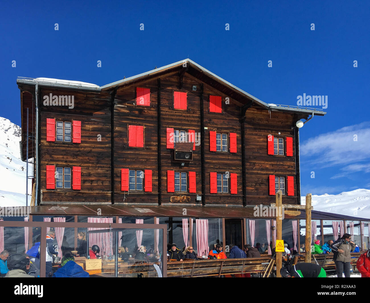 Zermatt, Switzerland - March 21, 2018: Hotel and mountain restaurant Fluhalp at elevation of 2606 meters in the skiing and hiking area of of Zermatt,  Stock Photo