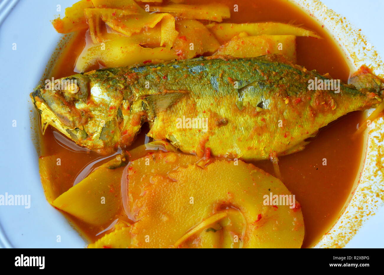 mackerel with bamboo shoot in spicy and sour soup on dish Stock Photo