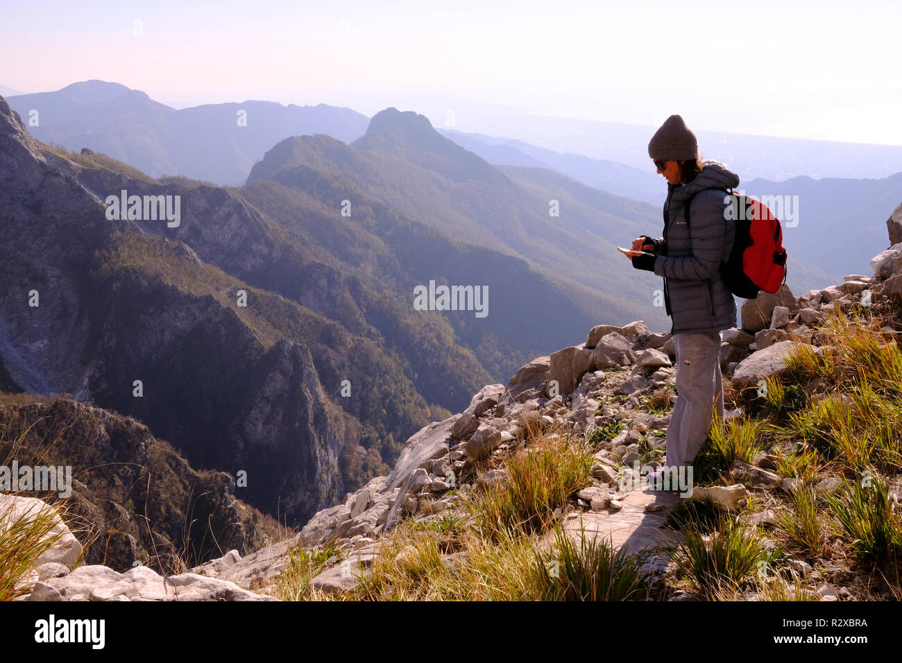 Unplugged: hiking on Tuscany montains. Solo woman, Italy. Stock Photo