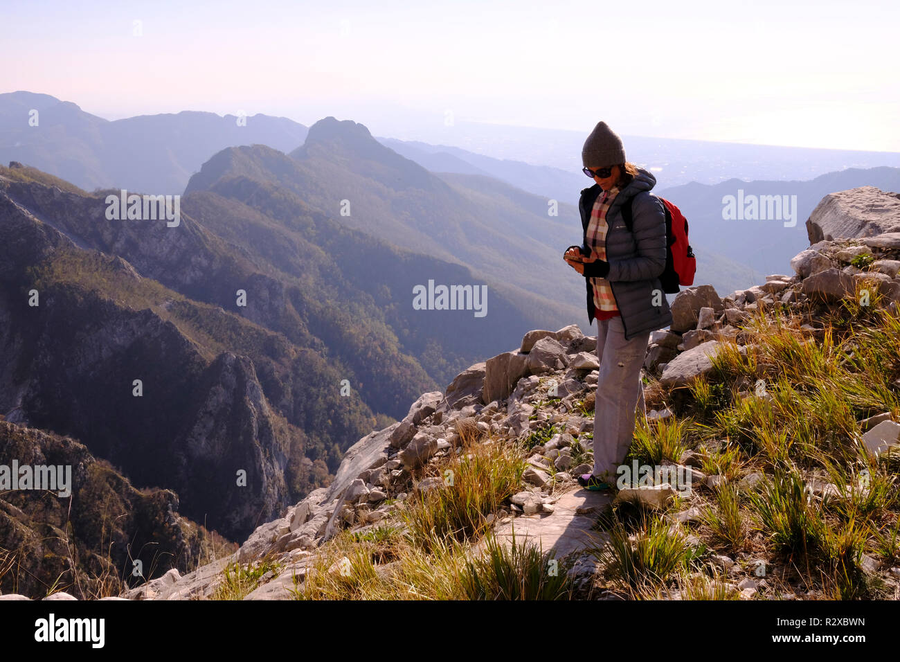 Unplugged: hiking on Tuscany montains. Solo woman, Italy. Stock Photo