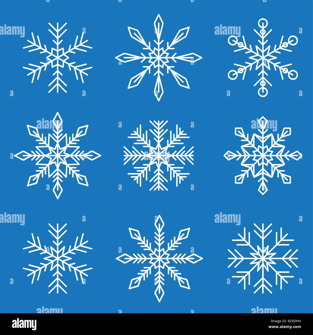 set of white different snowflakes isolated on blue background vector illustration EPS10 Stock Vector