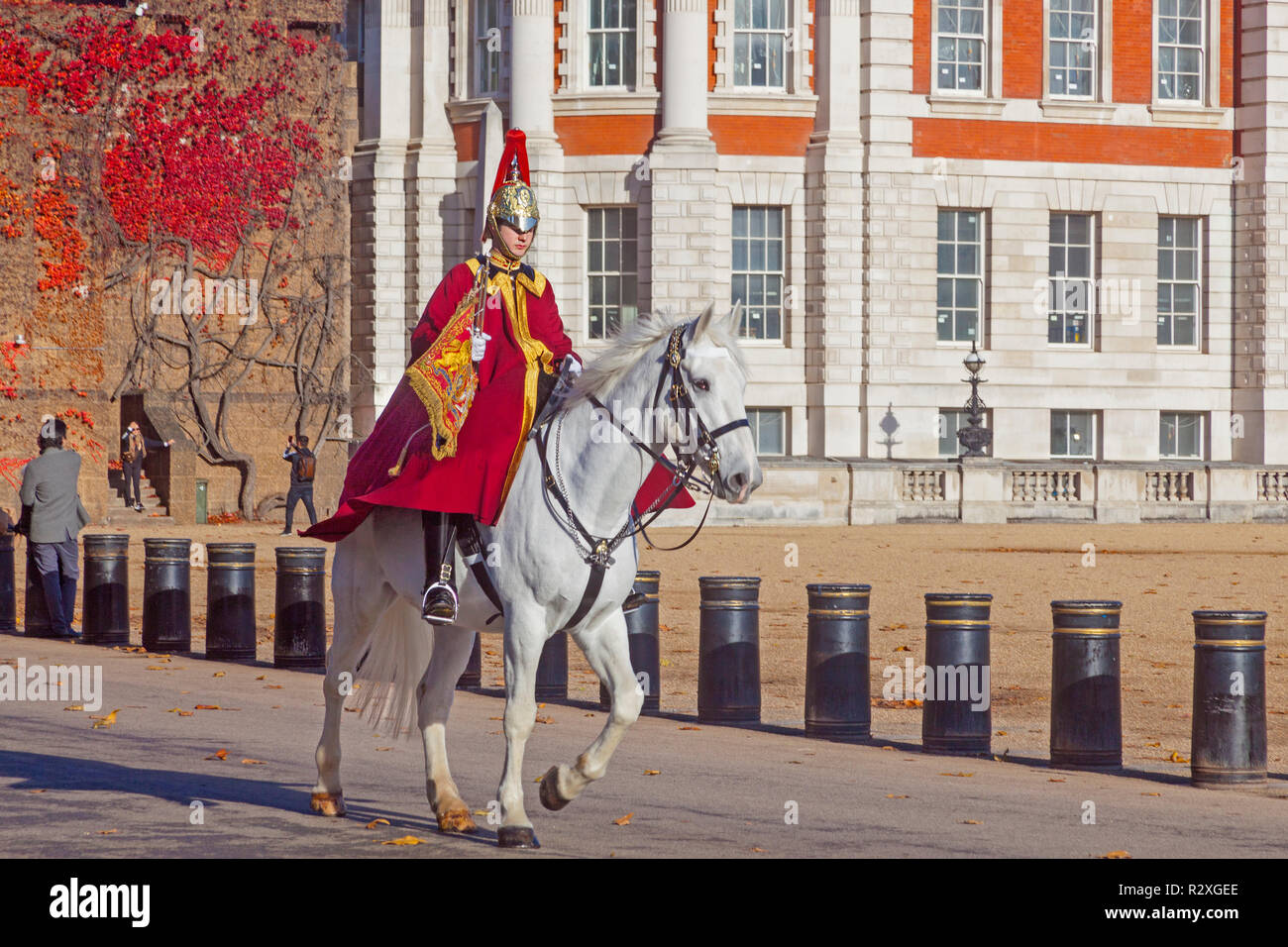 London, Westminster.   A lone trumpeter of the Royal Horse Guards making his way to Horse Guards Parade for the Changing of the Guard ceremony. Stock Photo