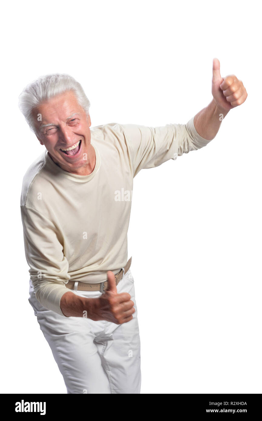 Happy senior man showing thumb up on white background Stock Photo - Alamy