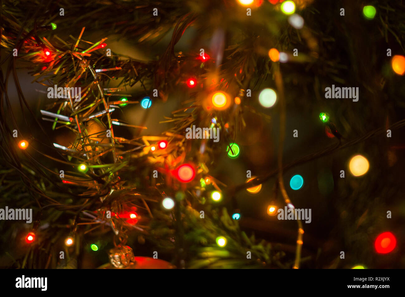 Christmas Background Garlands With Colorful Lights On A Decorated