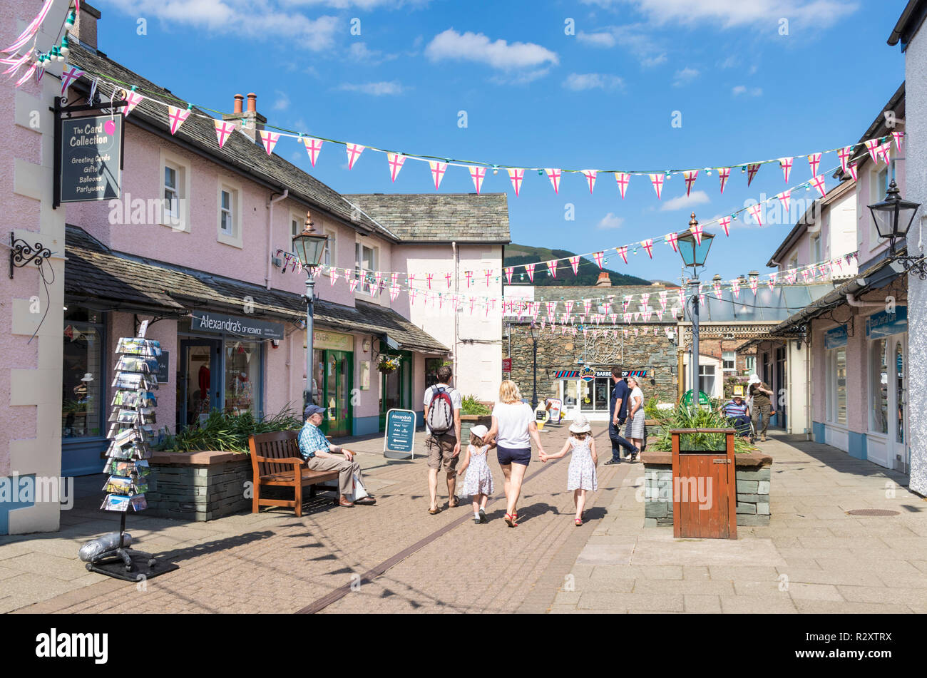 Lake district UK Keswick Lake District people shopping in Packhourse court an enclosed courtyard of shops in Keswick Cumbria England GB UK Europe Stock Photo