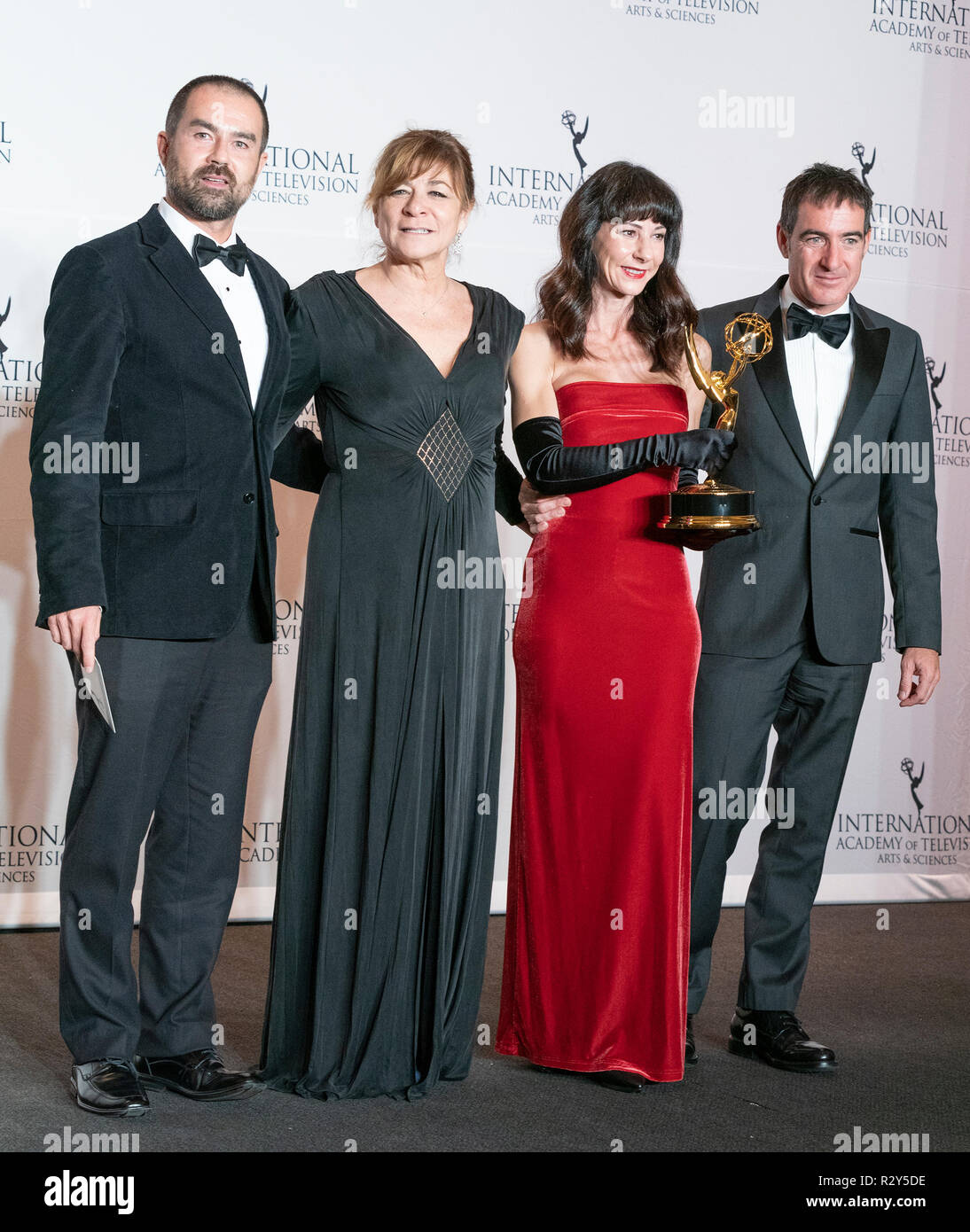 fame assembly former Alex Pina (R) and Sonia Martinez (2nd L) winner for the Drama Series during  the 46th International Emmy Awards at Hilton hotel (Photo by Lev  Radin/Pacific Press Stock Photo - Alamy