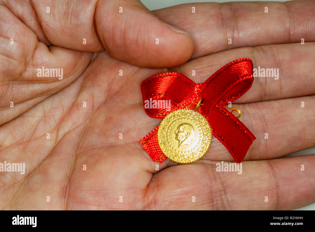 a Turkish tradition. quarter gold for weddings and birth Stock Photo - Alamy