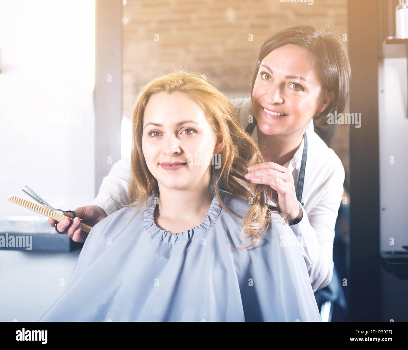 Mature woman hair brush dryer hi-res stock photography and images - Alamy