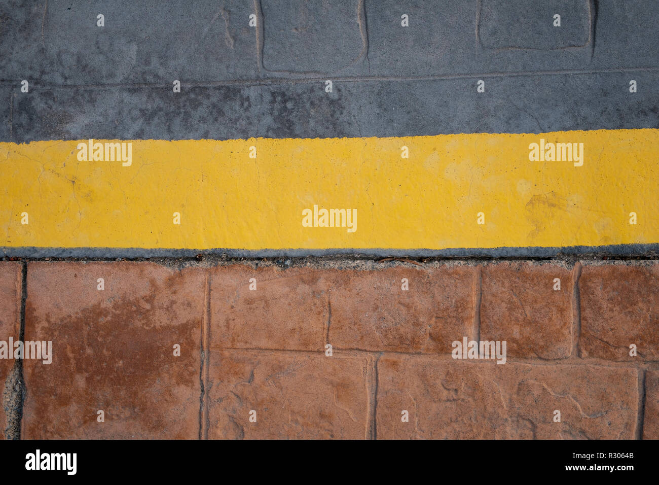 sidewalk border yellow line on road,  abstract background - Stock Photo