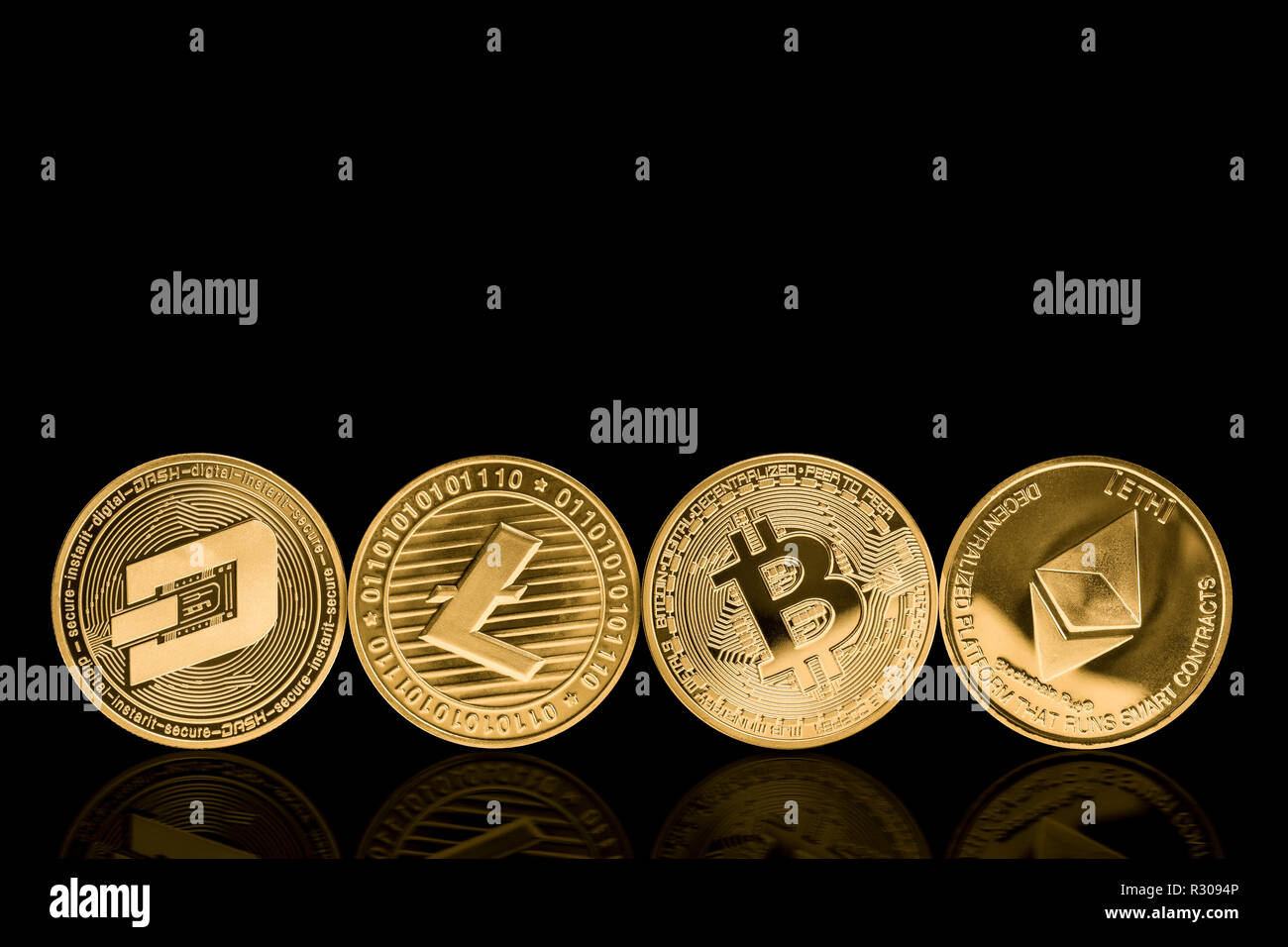 golden metal crypto currency coins on black Stock Photo