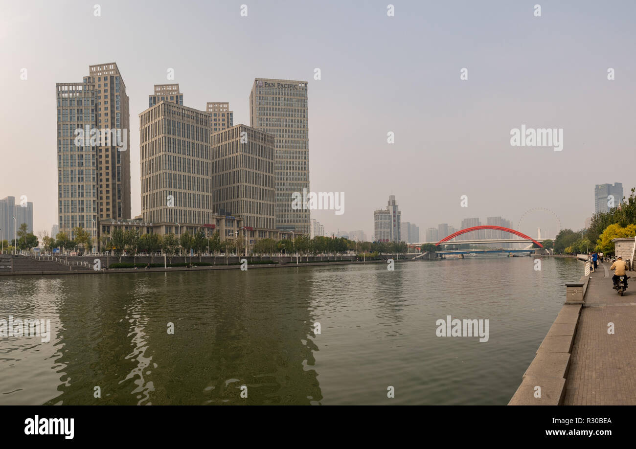 Tientsin Eye and modern buildings by RIver Haihe in Tianjin Stock Photo
