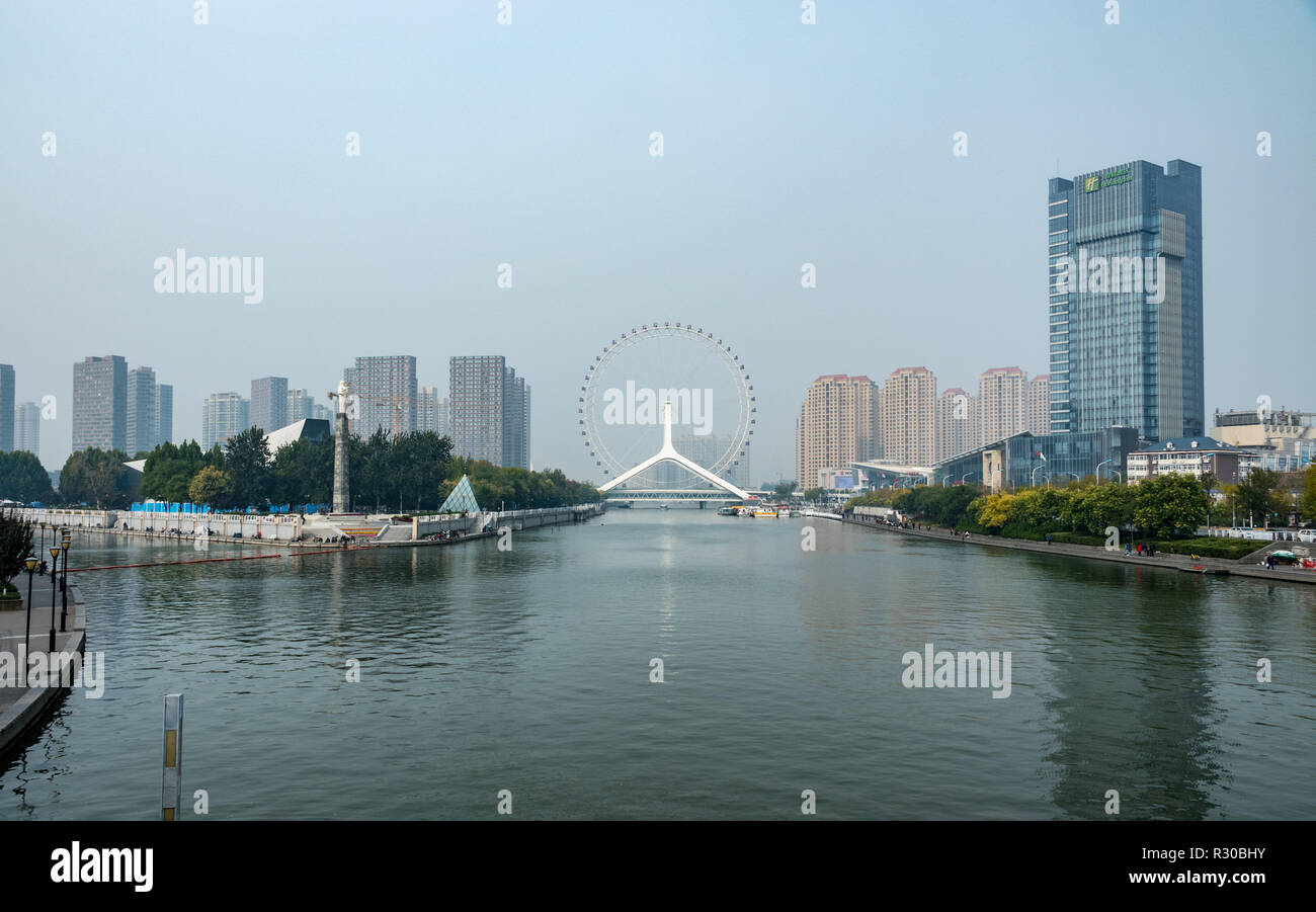 Tientsin Eye and modern buildings by RIver Haihe in Tianjin Stock Photo