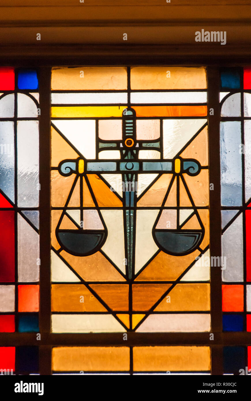 Art, stained glass, Symbols, sword, balnace, justice Stock Photo Alamy