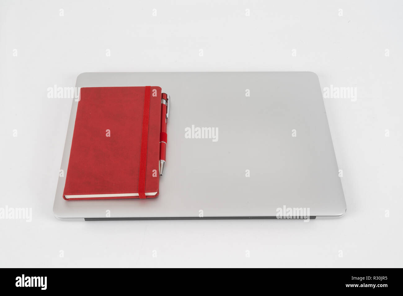 laptop and notepad in office Stock Photo Alamy