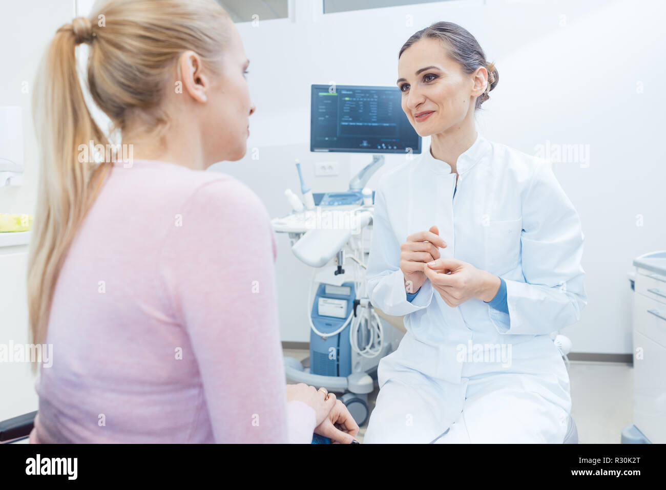 Woman at the gynecology examination with doctor Stock Photo