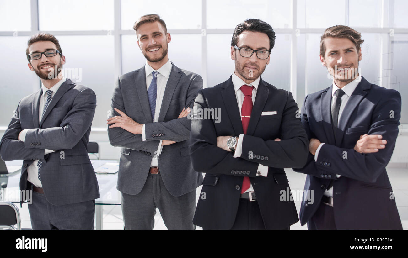 group of business people standing in the office Stock Photo - Alamy