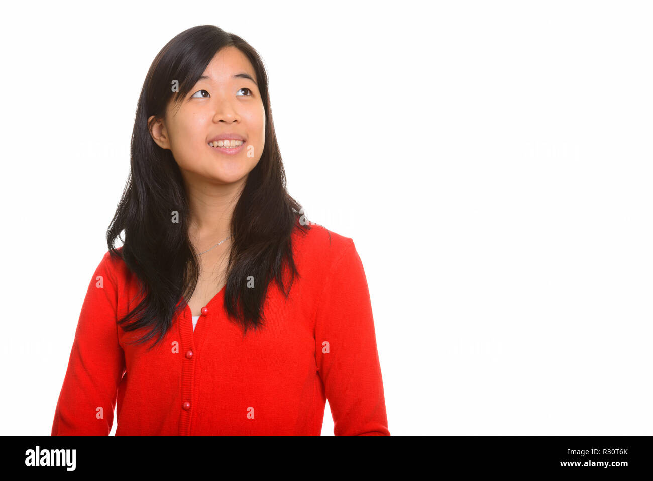 Happy asian woman thinking hi-res stock photography and images - Alamy