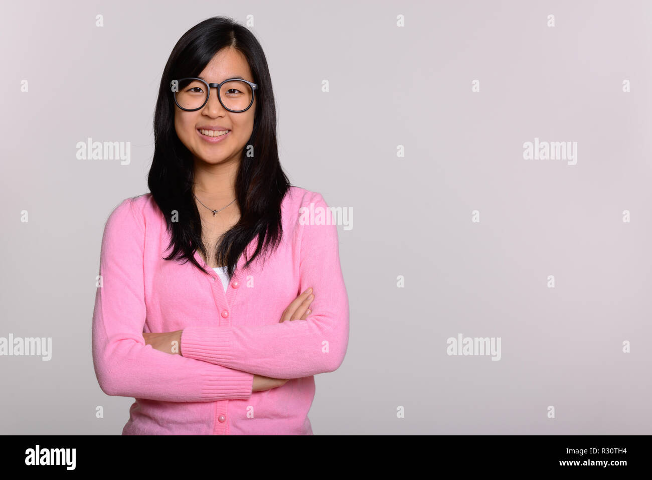 Chinese woman crossed arms hi-res stock photography and images - Alamy
