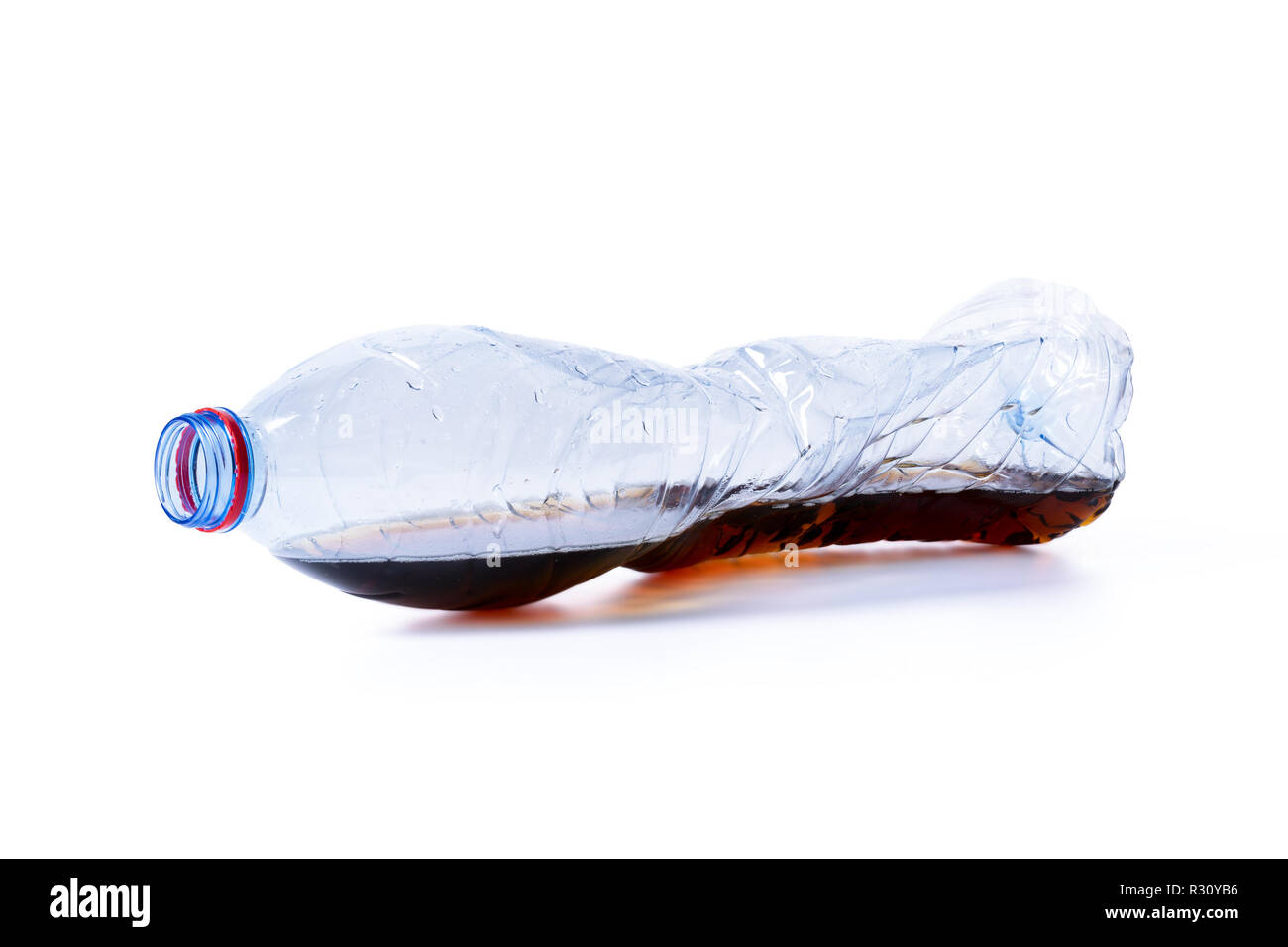 almost empty plastic waste bottle isolated on white background Stock Photo