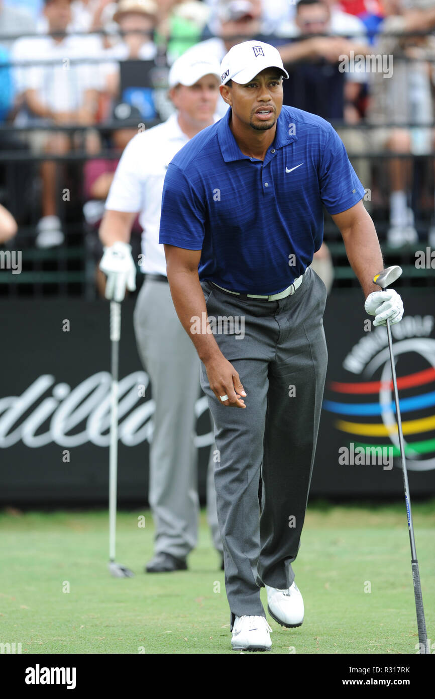 DORAL, FL - MARCH 10: Tiger Woods and Phil Mickelson during the first round of the 2011 WGC- Cadillac Championship at the TPC Blue Monster at the Doral Golf Resort and Spa. A severe storm ripped through the course causing all kinds of damage including the scoreboard falling down.  on March 10, 2011 in Doral, Florida.   People:  Tiger Woods Stock Photo