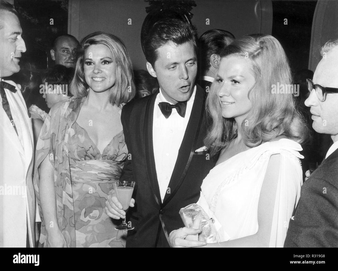 US actor Ed Byrnes (M), his wife (l) and actress Ingrd van Bergen at the  opening ceremony of the XVI Berlinale on 24 June 1966 in Berlin. Byrnes is  best known in